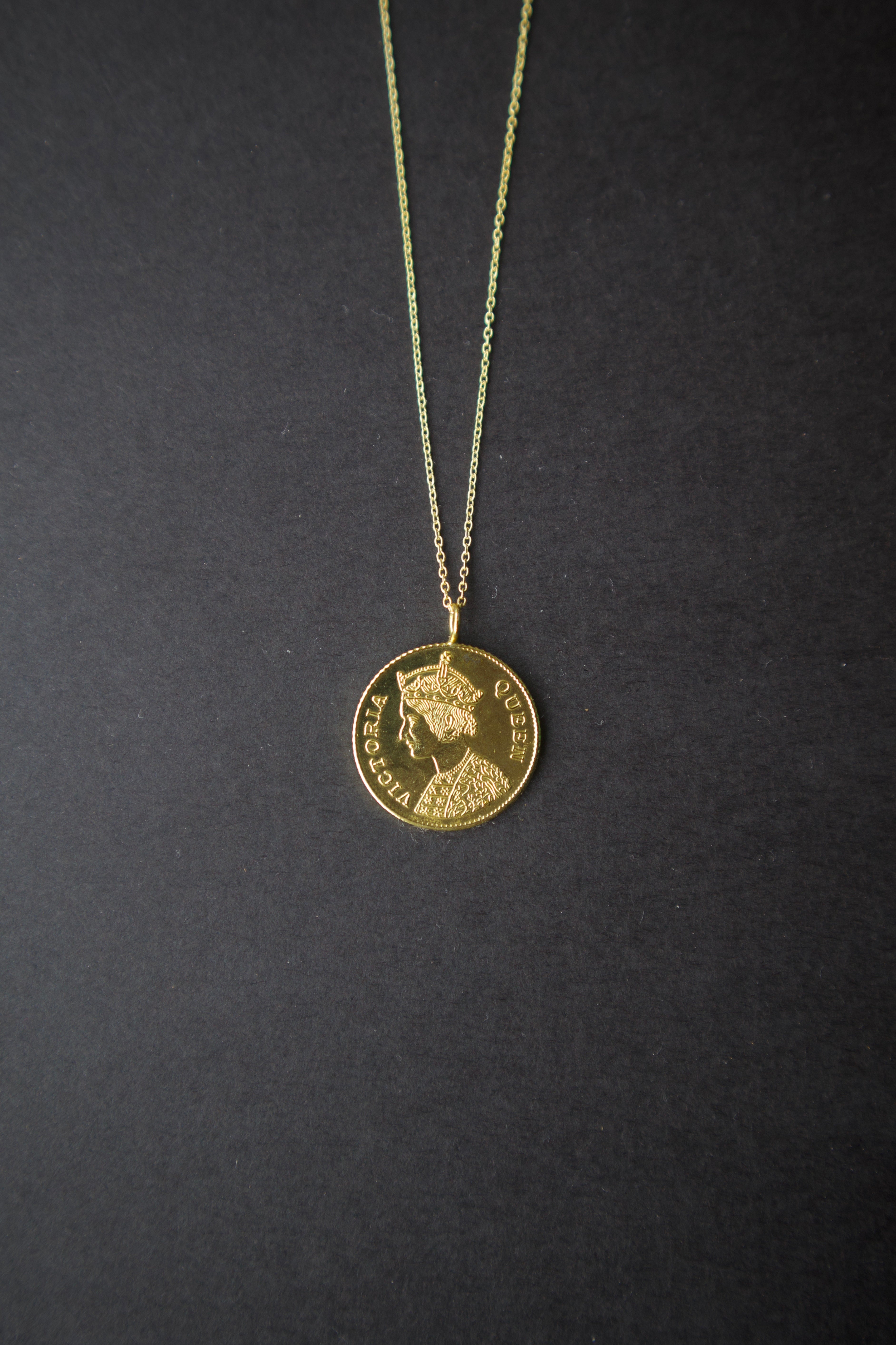 Empress coin pendant