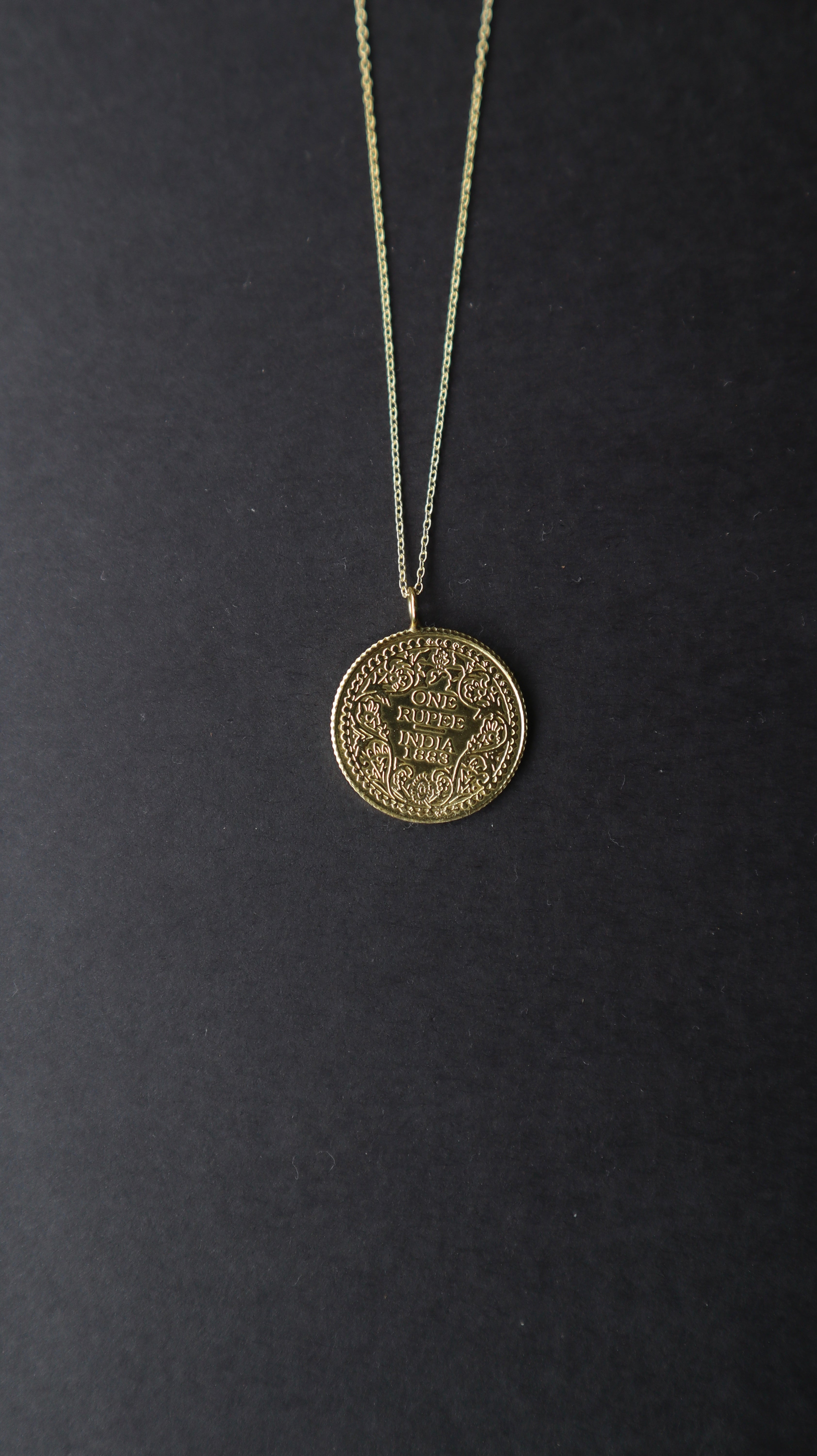 Empress coin pendant